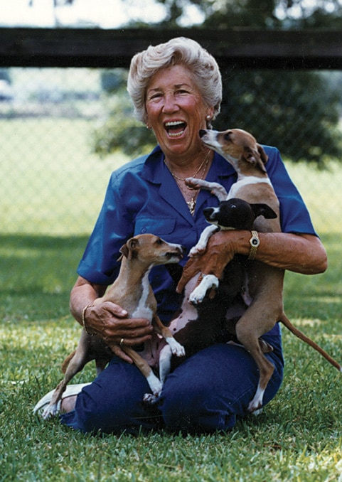 Carol and pups. (Taking puppy pictures is always interesting... the thrill of victory and the agony of defeat.)