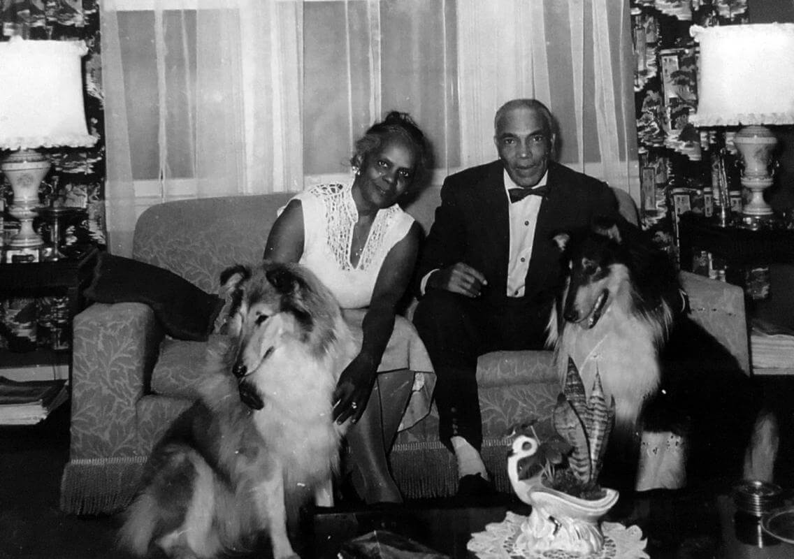 Dr. James McCain and his wife, Gertie, at home enjoying their Collies.