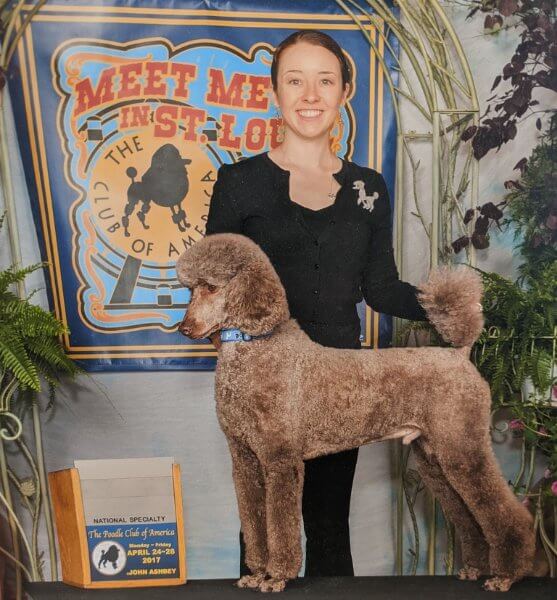 Kimberly Flatley with her dog, a Standard Poodle named “Leah”