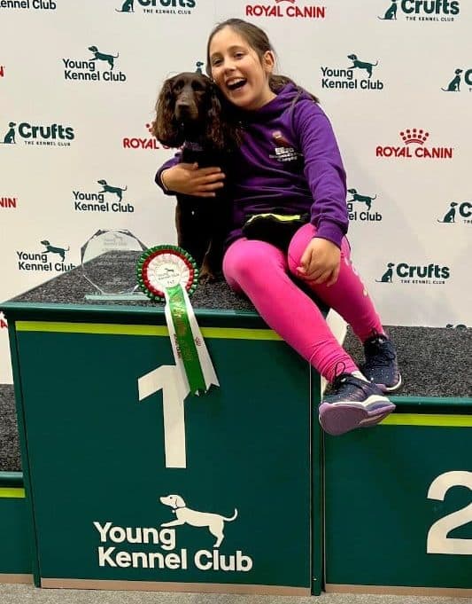 Young girl named Eliza winning Young Kennel Club Crufts 2023 Jumping