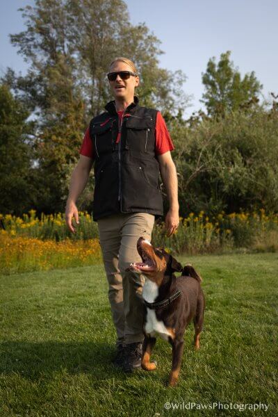 Ben Parker walking his Appenzeller Sennenhund named "Bärli von Deroche"