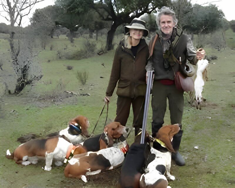 Claudia with husband, Guillermo Gonzalez Suarez, and their Topsfield-Lebrera Basset Hound pack in Spain.